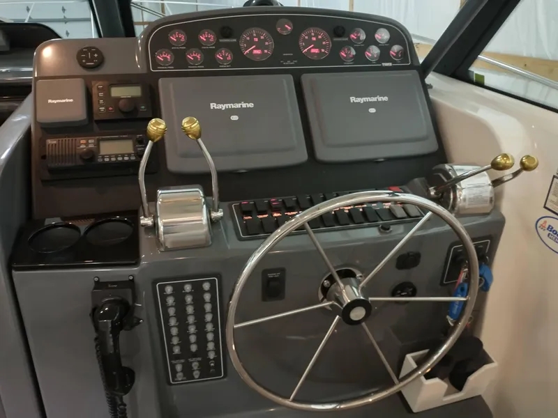 Slide: The Image of Helm of 2001 Tiara Yachts 3800 Open with Raymarine equipment. - 10