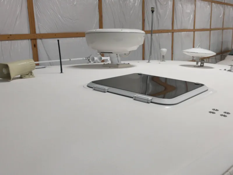 Slide: The Image of Tiara Yachts 3800 Open 2001, deck view with hatches and antennas. - 13