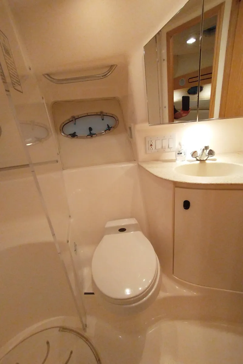Slide: The Image of Tiara Yachts 3800 Open 2001 bathroom with toilet and sink. - 16