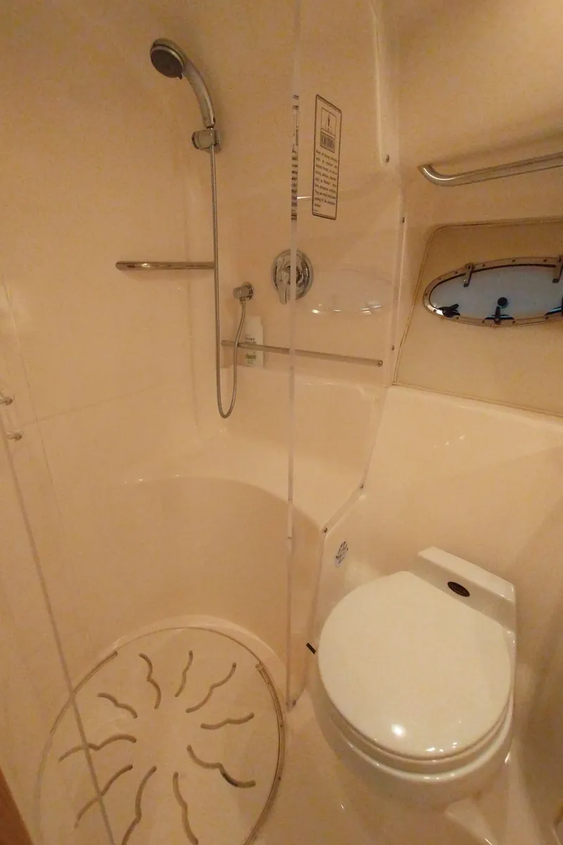 Slide: The Image of Tiara Yachts 3800 Open 2001 bathroom with shower and toilet. - 17