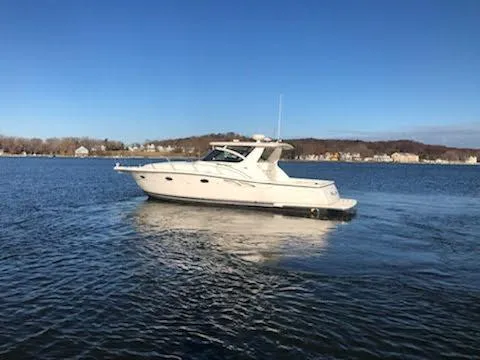 Slide: The Image of 2001 Tiara Yachts 3800 Open on calm water. - 2