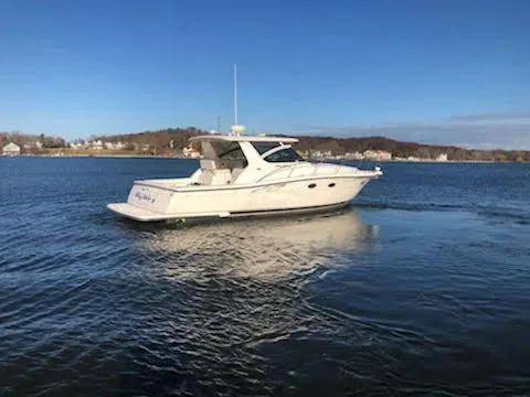 Slide: The Image of 2001 Tiara Yachts 3800 Open on calm water. - 4