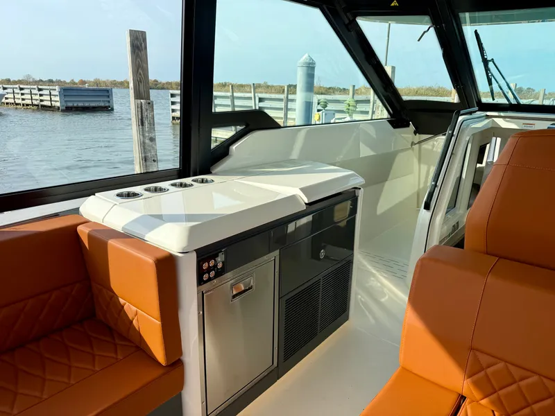 Slide: The Image of Interior of the Saxdor 400 GTC with brown seating and modern amenities. - 19