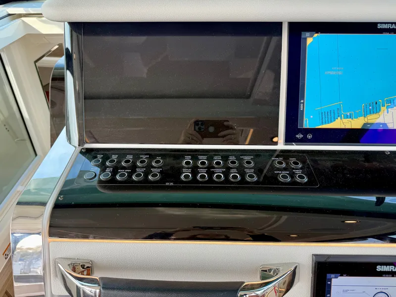 Slide: The Image of The image shows the dashboard of a Saxdor 400 GTC with modern navigation screens. - 15