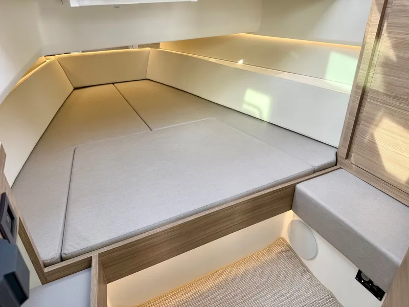 Slide: The Image of Interior of the Saxdor 400 GTC with sleek, light upholstery and wood paneling. - 29
