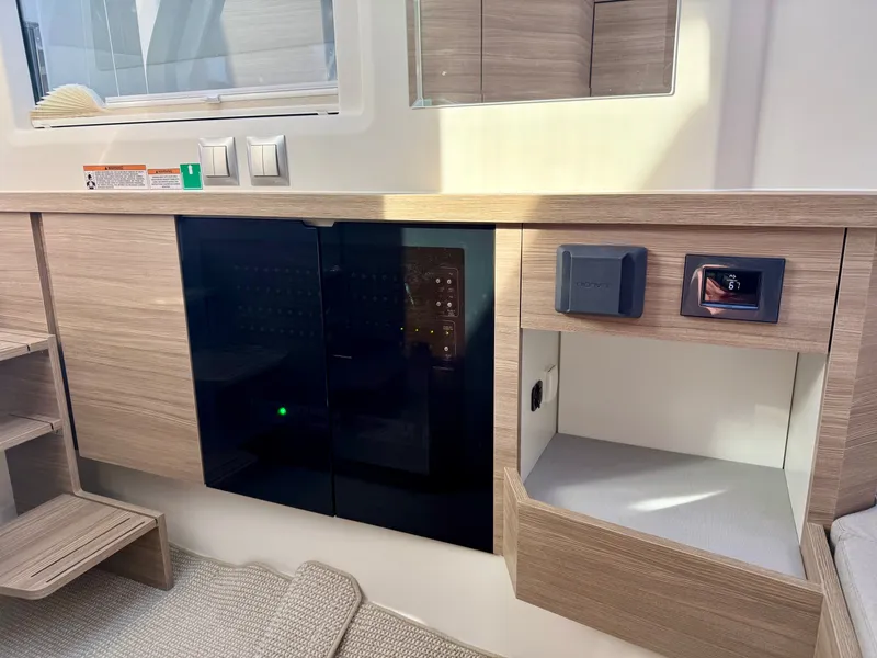 Slide: The Image of Interior of the Saxdor 400 GTC with wood paneling and modern controls. - 31
