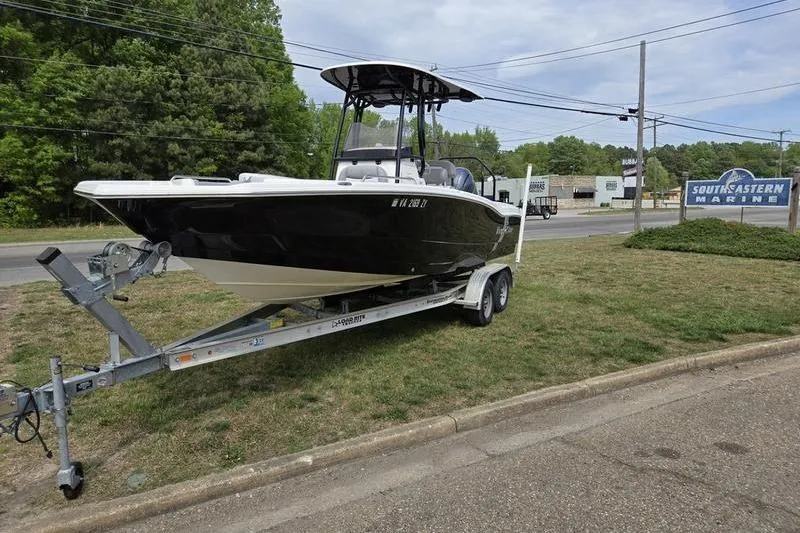 The Image of 2021 NauticStar 231 Hybrid boat on trailer at Southeastern Marine dealership. - 0