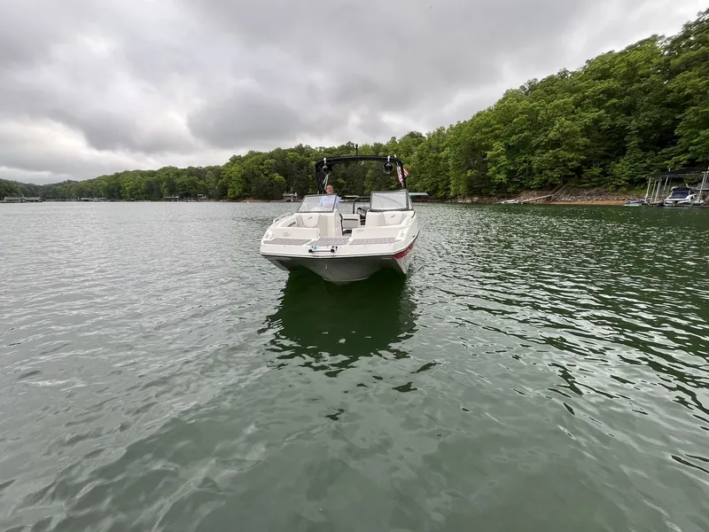 Slide: The Image of Starcraft SVX OB 230 DC OB 2025 on a calm lake. - 10