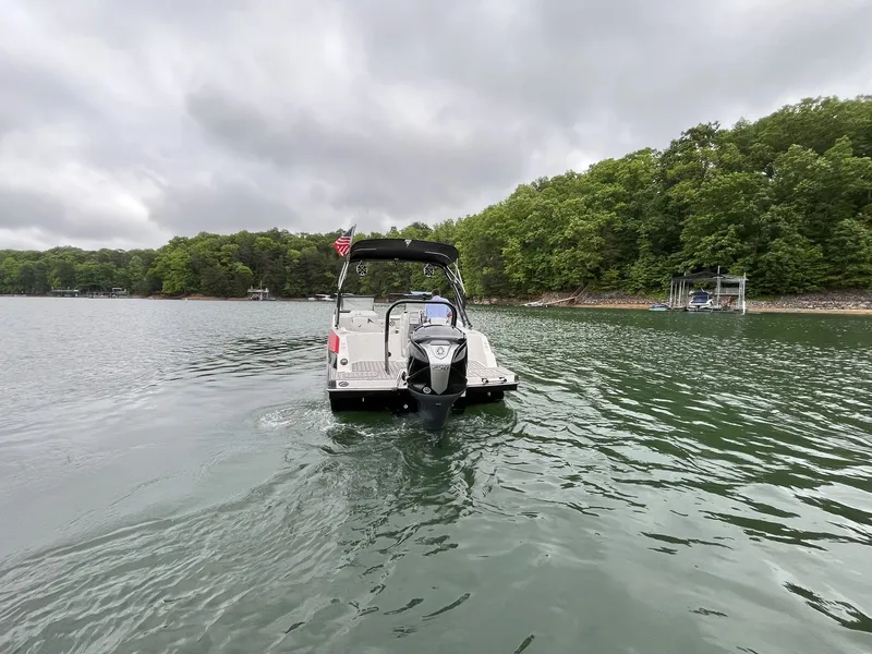 Slide: The Image of Starcraft SVX OB 230 DC OB 2025 on a serene lake. - 12