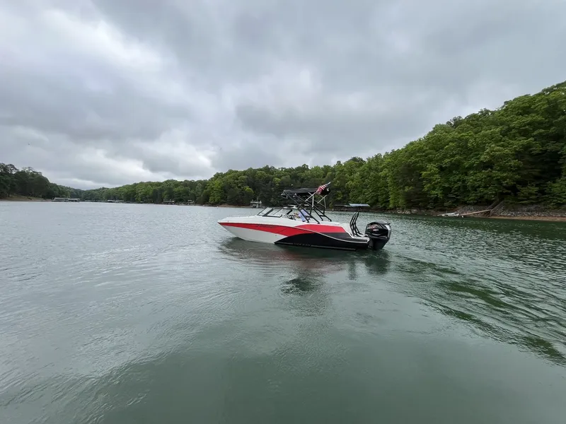 Slide: The Image of Starcraft SVX OB 230 DC OB 2025 on a tranquil lake. - 15