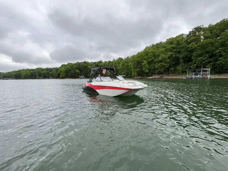 Slide: The Image of Starcraft SVX OB 230 DC OB 2025 on a calm lake. - 3