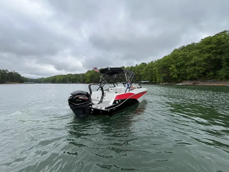 Slide: The Image of Starcraft SVX OB 230 DC OB 2025 on a serene lake. - 4