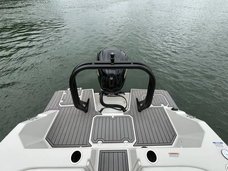 Slide: The Image of Rear view of Starcraft SVX OB 230 DC OB boat, 2025 model. - 9