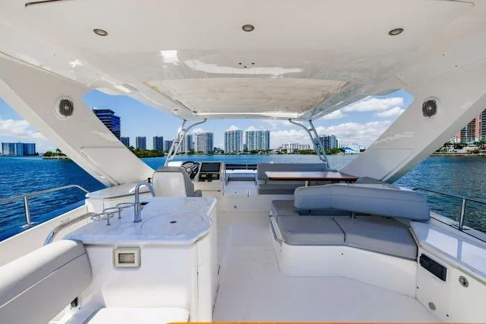 Slide: The Image of Luxurious 2016 Sea Ray L650 Fly yacht interior with seating and ocean view. - 4