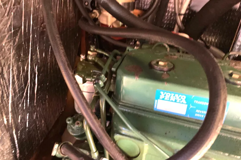 Slide: The Image of Engine compartment of a 1990 Tartan 372 sailboat with Volvo Penta engine. - 31