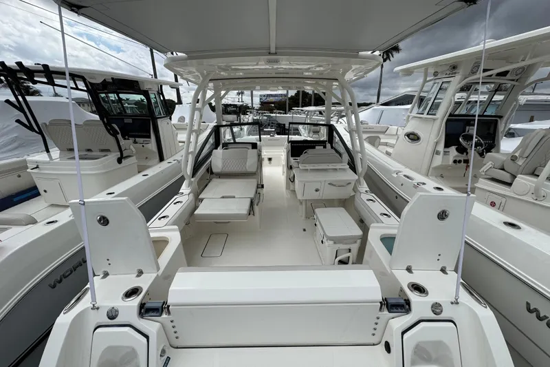Slide: The Image of 2024 World Cat 260 DC-X boat interior showcasing seating and helm station. - 15