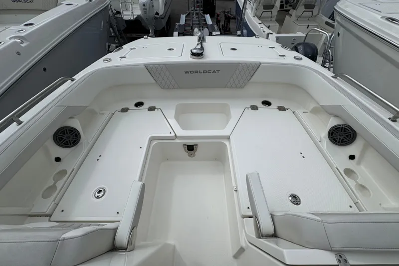 Slide: The Image of 2024 World Cat 260 DC-X boat interior with seating and storage compartments. - 24