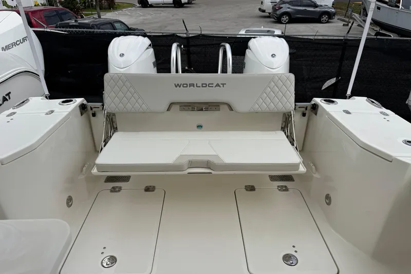 Slide: The Image of 2024 World Cat 260 DC-X boat interior with seating and dual engines. - 43