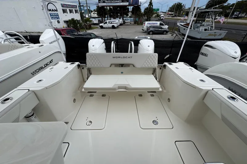 Slide: The Image of 2024 World Cat 260 DC-X boat interior with seating and storage compartments. - 44