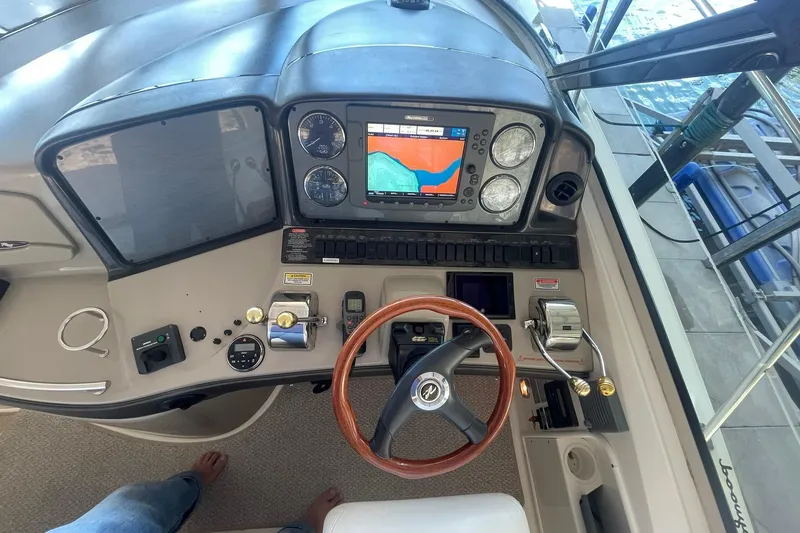 Slide: The Image of HELM OVERVIEW W/SEA RAY GAUGES, RAY MARINE COLOR CHART PLOTTER & SOUNDER, VHF RADIO, SMARTCRAFT, & BOW THRUSTER - 14