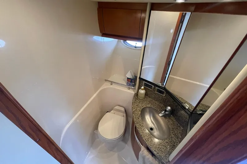 Slide: The Image of MASTER STATEROOM PRIVATE HEAD WITH VACU-FLUSH TOILET SYSTEM, & VANITY WITH SS RECESSED SINK. - 42