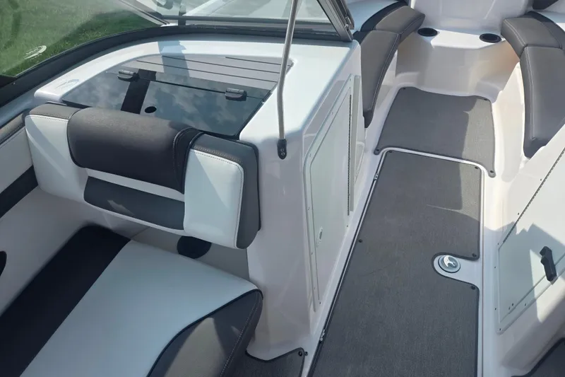 Slide: The Image of 2022 Yamaha AR210 boat interior with sleek seating and modern design. - 13