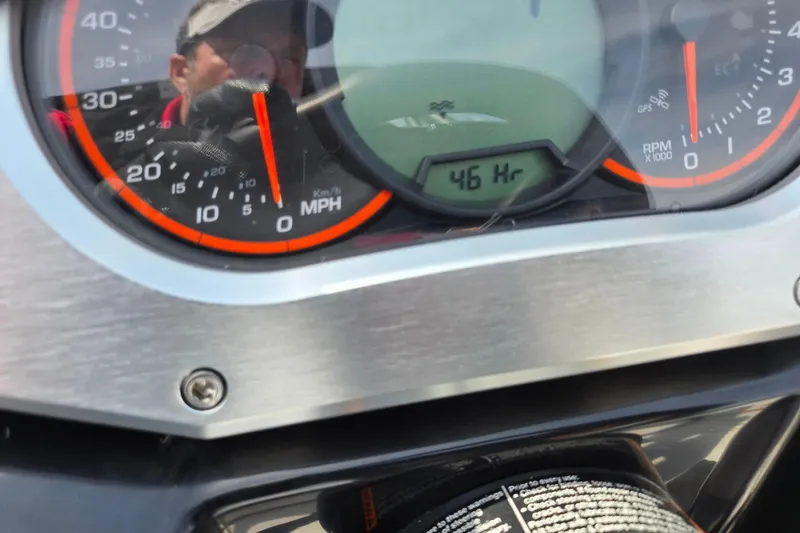 Slide: The Image of Dashboard of a 2021 Scarab 165 ID showing 46 hours on the odometer. - 23