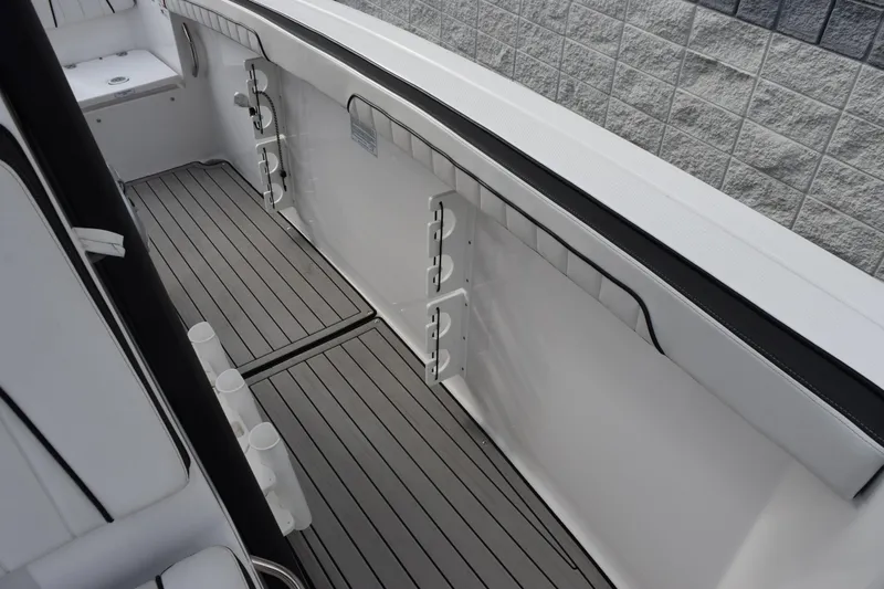 Slide: The Image of 2021 Yamaha Boats 255 FSH Sport E interior with sleek deck design. - 13