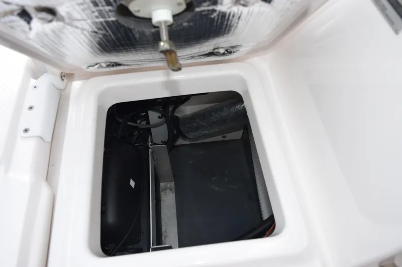 Slide: The Image of Open storage compartment in 2021 Yamaha Boats 255 FSH Sport E. - 18
