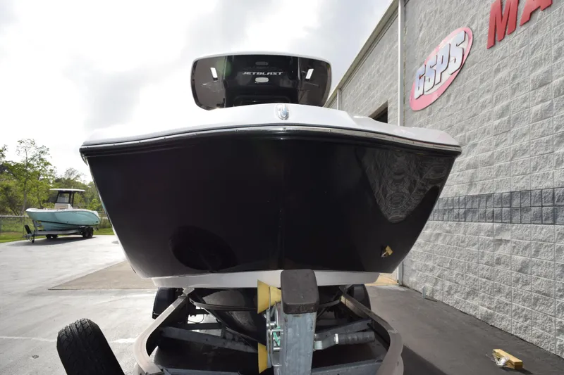 Slide: The Image of 2021 Yamaha Boats 255 FSH Sport E on trailer, front view at dealership. - 3