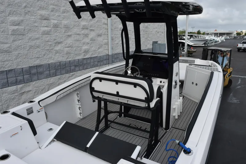 Slide: The Image of 2021 Yamaha Boats 255 FSH Sport E, sleek interior view, modern design, spacious layout. - 7