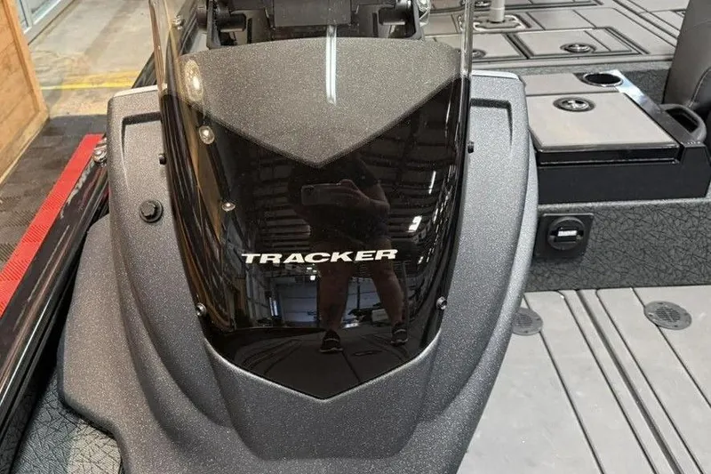 Slide: The Image of 2026 Tracker Savage 215 boat interior with sleek black dashboard design. - 14