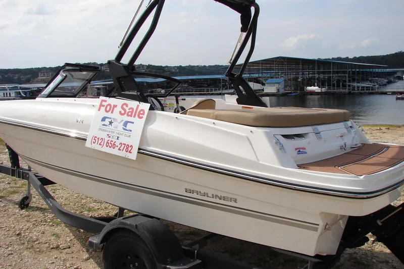 The Image of 2021 Bayliner VR4 Bowrider I/O for sale by lake, contact number displayed. - 0