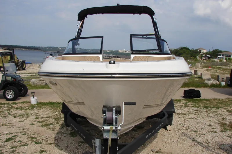 Slide: The Image of 2021 Bayliner VR4 Bowrider I/O on trailer by lakeside, ready for launch. - 2