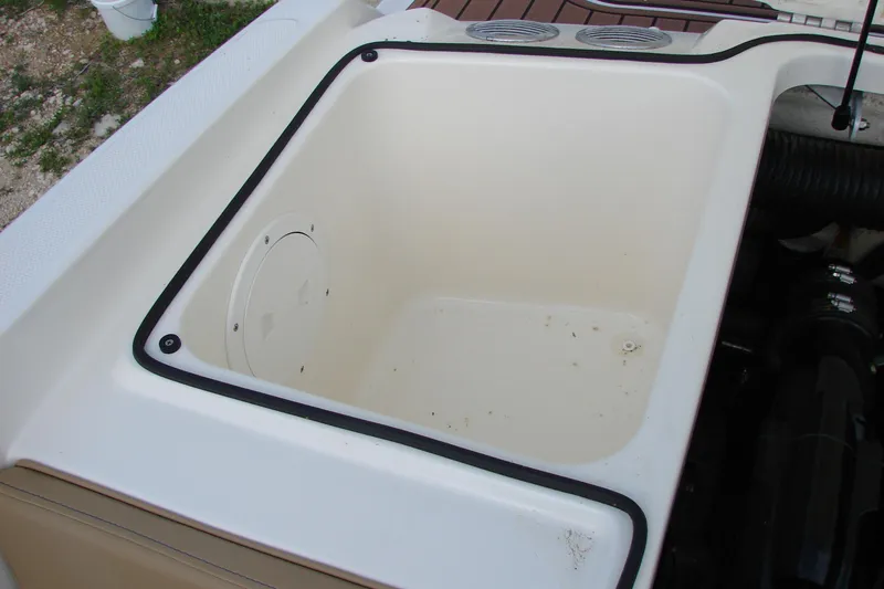 Slide: The Image of Storage compartment on a 2021 Bayliner VR4 Bowrider I/O boat. - 21