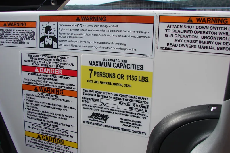 Slide: The Image of Safety warnings and capacity limits on a 2021 Bayliner VR4 Bowrider I/O boat. - 22