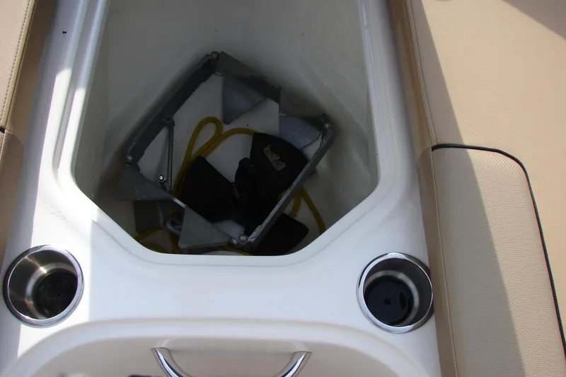 Slide: The Image of 2021 Bayliner VR4 Bowrider I/O storage compartment with anchor and rope. - 27