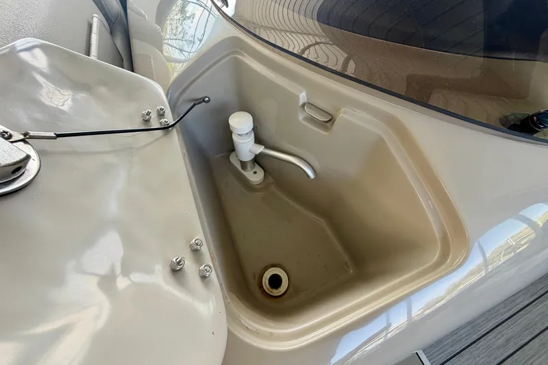 Slide: The Image of 2017 South Bay 725 RS boat sink with faucet and drain. - 10
