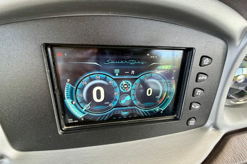 Slide: The Image of Dashboard display of a 2017 South Bay 725 RS boat, showing speed and RPM gauges. - 12
