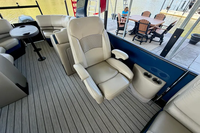 Slide: The Image of Luxurious interior of 2017 South Bay 725 RS pontoon boat with comfortable seating. - 13