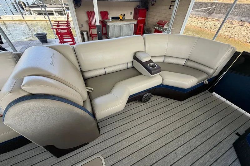 Slide: The Image of Luxurious seating on a 2017 South Bay 725 RS pontoon boat with cup holder. - 17