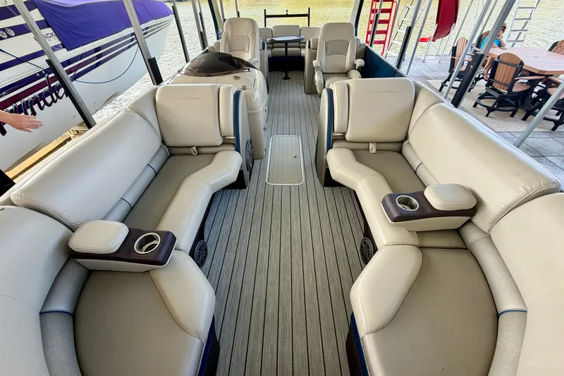 Slide: The Image of Interior of a 2017 South Bay 725 RS pontoon boat with luxurious seating. - 21