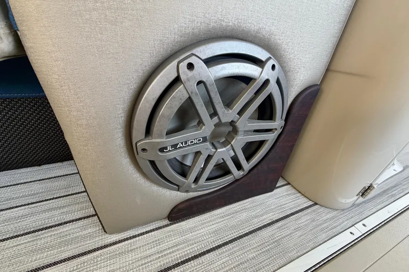 Slide: The Image of JL Audio speaker on 2017 South Bay 725 RS boat interior. - 27