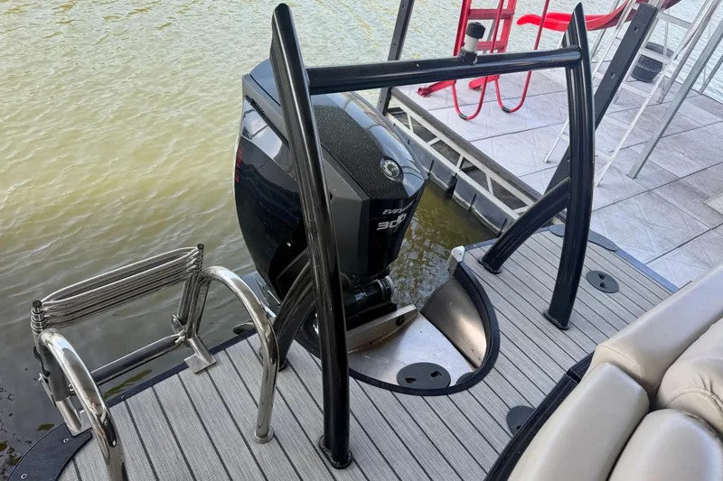 Slide: The Image of 2017 South Bay 725 RS boat with Evinrude 300 engine and swim ladder. - 29