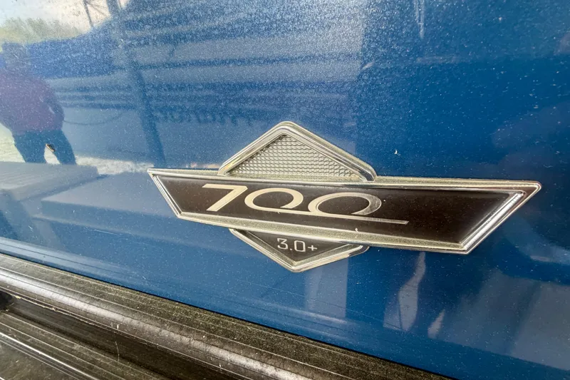 Slide: The Image of Close-up of 2017 South Bay 725 RS emblem on blue surface. - 30