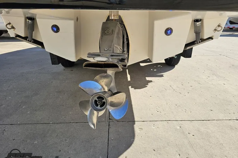 Slide: The Image of 2010 Chaparral 276 SSX boat stern with propeller and underwater lights. - 26