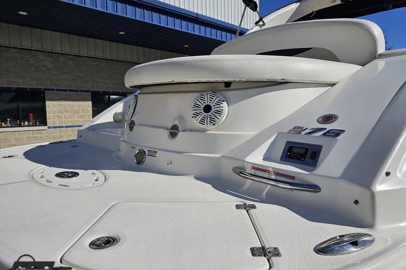 Slide: The Image of 2010 Chaparral 276 SSX boat rear deck with seating and speaker detail. - 30