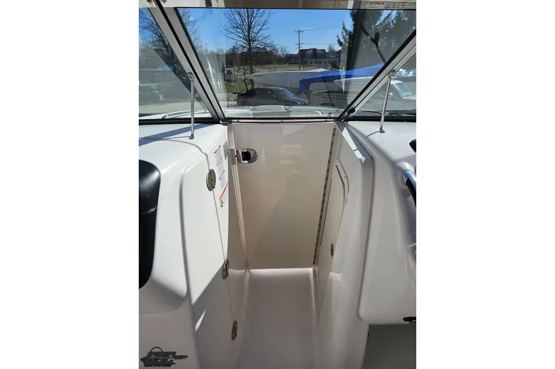 Slide: The Image of Interior view of a 2010 Chaparral 276 SSX boat cockpit area. - 75