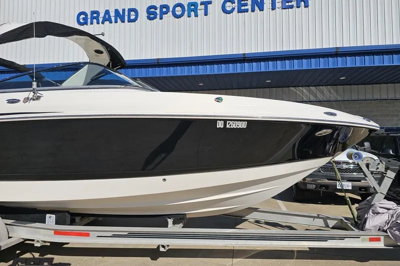 Slide: The Image of 2010 Chaparral 276 SSX boat on trailer at Grand Sport Center. - 8
