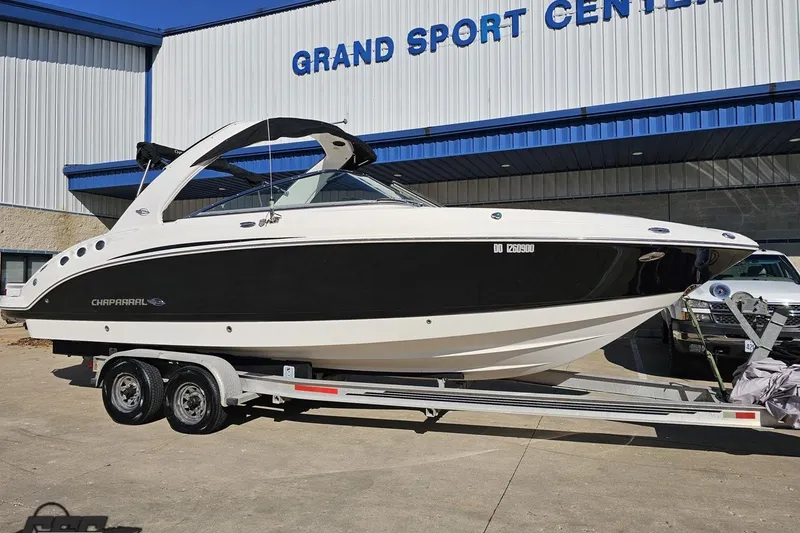 Slide: The Image of 2010 Chaparral 276 SSX boat on trailer at Grand Sport Center. - 9